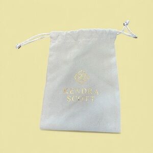 Kendra Scott Light Gray Pouch with Gold Logo 5 x 3 “